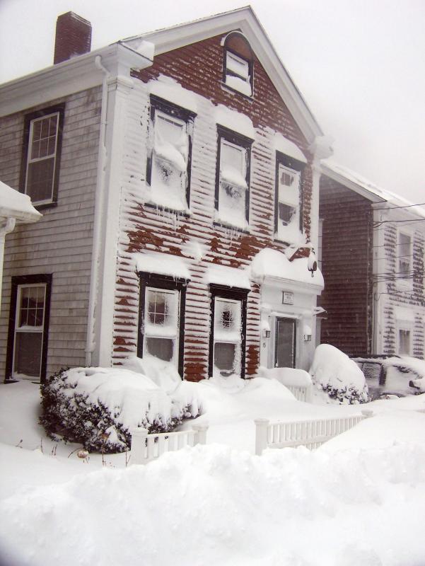 A snow covered home on Water Street in Mattapoisett. BY MATTHEW BERNAT